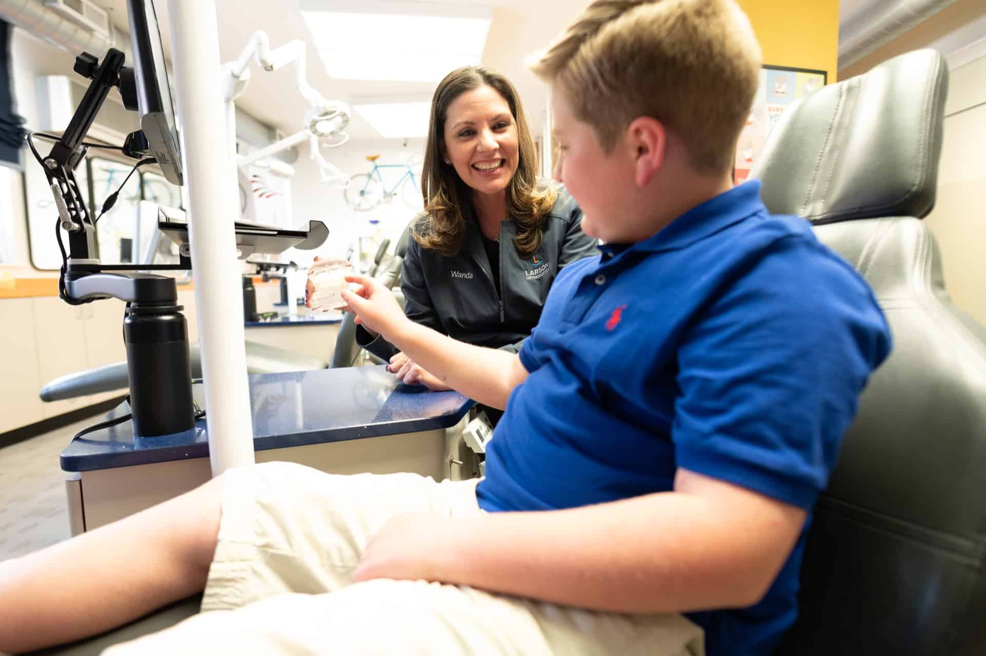 Staff Candids Larson Orthodontics Alexandria Virginia 2021 184 - How Do Rubber Bands Help With My Braces?